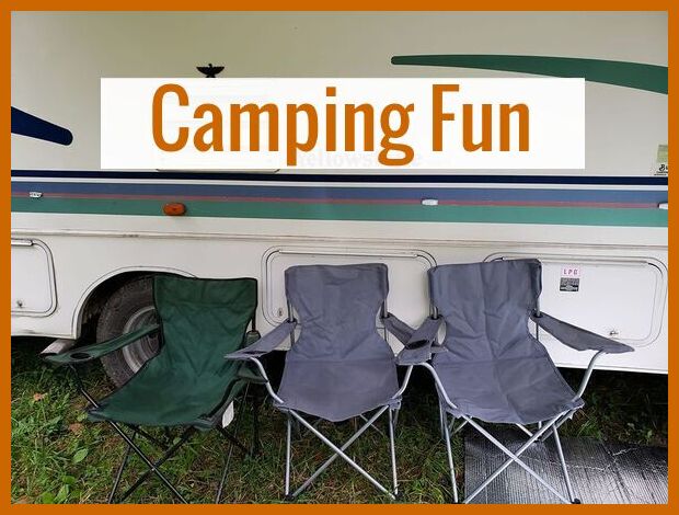 'Camping Fun' is written with a white background in front of a camper and three chairs